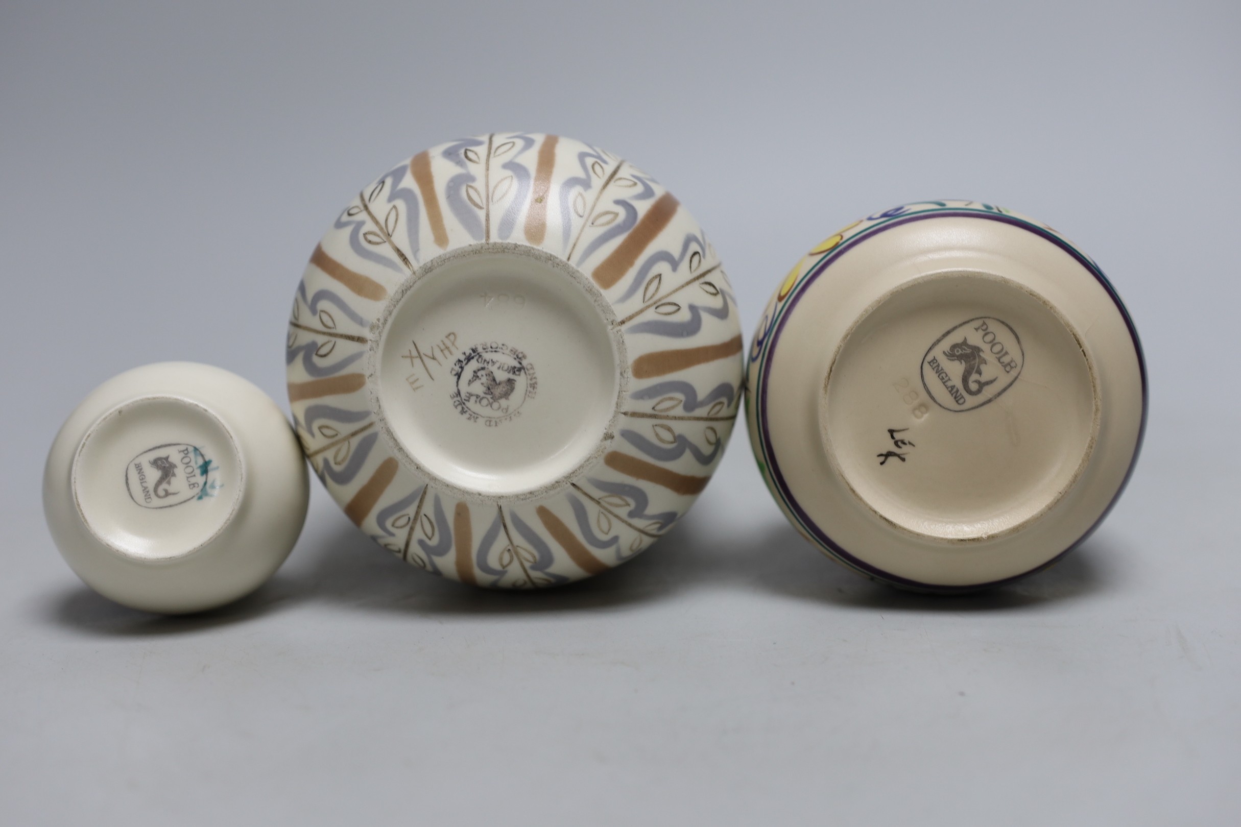 A Poole jam dish and cover, together with two Poole vases